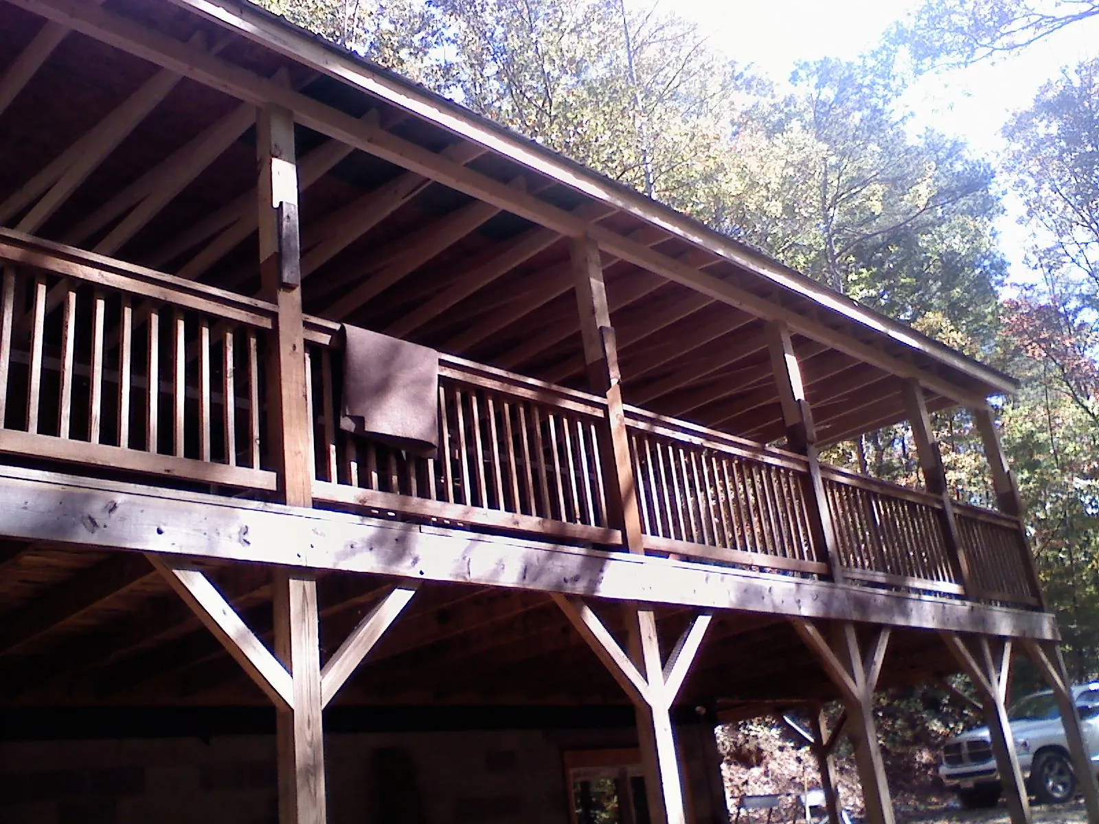 Timber framing under a new elevated porch and deck — Roof Leak Repair in Arona by Roofing Brothers